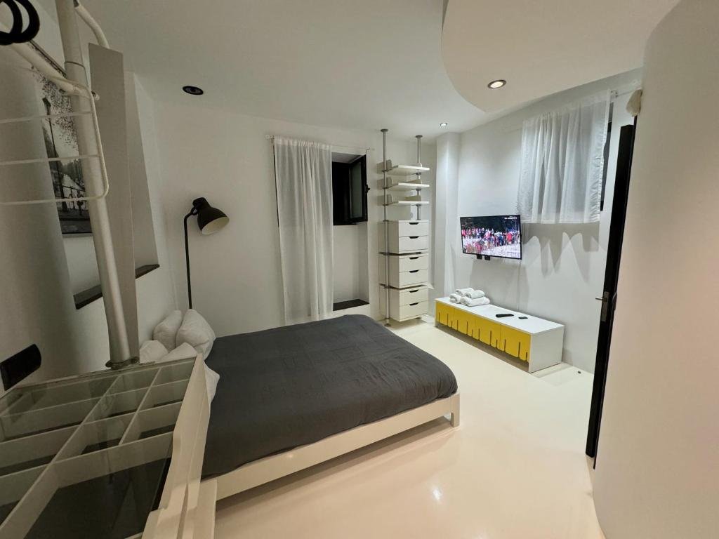 Sea Breeze Boutique House — quarto no piso inferior